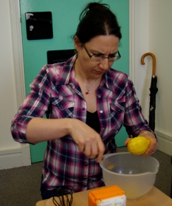 Christina zests the lemons for our "lemmond cream"
