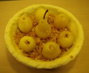 The pears arranged in our warden pie, ready for the pastry top!